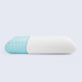 Two-toned blue and white pillow on a light gray background, featuring breathable layers