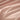 Close-up of a blush cotton jersey pillowcase, emphasizing smooth, breathable texture for comfortable sleep
