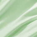 Close-up of textured blue fabric with folds
