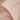 blush woven bedding fabric detail with clear button and natural cotton tie, high-quality hotel-style duvet cover close-up

