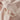 blush woven bedding fabric detail with clear button and natural cotton tie, high-quality hotel-style duvet cover close-up
