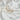 White woven bedding fabric detail with clear button and natural cotton tie, high-quality hotel-style duvet cover close-up

