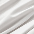 Close-up of textured blue fabric with folds
